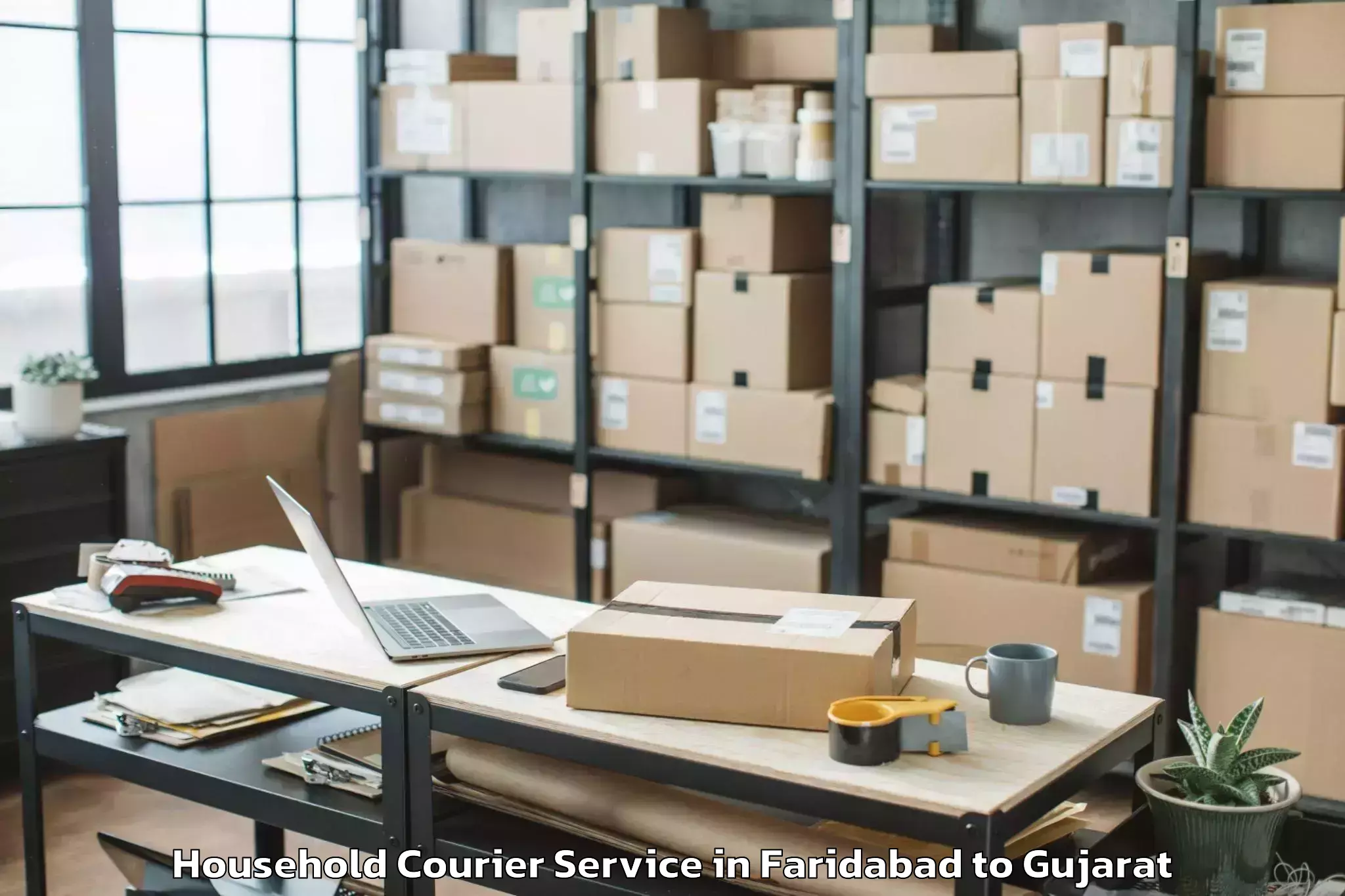 Book Your Faridabad to Karjan Household Courier Today